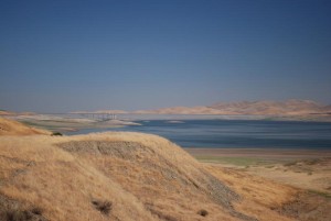 San Luis Reservoir, Central California, in drought condition in 2008, with water at 20% of capacity.  Photo by Len Wilcox
