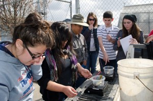 Sanger High Ag students weigh and measure the fish at the start of their aquaponics project.  Left to right: students Erin Paz, Bianca De La Cruz, advisor John Wright, instructor Audrey Bonomi, students Estevan Brown and Leila Kimbler-Cantu.