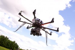 http://www.dreamstime.com/stock-image-uav-photography-helicopter-multirotor-slr-camera-attached-image36995961