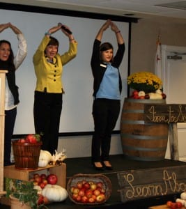 CDFA Secretary Karen Ross (center) helps demonstrate the five F’s of agriculture–Food, Fiber, Flower, Forests and Fuel–at a California Foundation for Agriculture in the Classroom event this month in Santa Cruz. The picture depicts the impacts of forests, showing that they help provide housing. (Courtesy CDFA)
