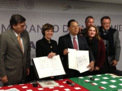 CDFA Secretary Karen Ross (second from left) at today’s signing with representatives of the Mexican agricultural agency SAGARPA and the USDA’s Foreign Agricultural Service. (Photo courtesy of CDFA)