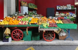 Fruits and vegetables in cart at market