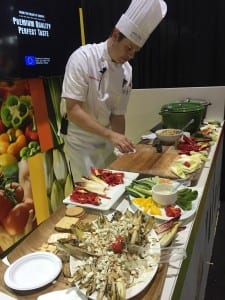 A chef cooks up creations at PMA Fresh Summit