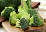 Fresh broccoli on a wooden board