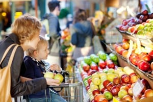 family at farmers market connecting
