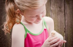 beautiful girl with baby chick