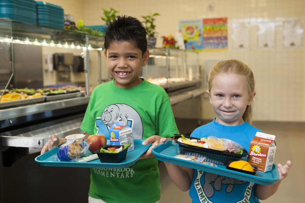 Kids in a school cafeteria to promote the My Plate and YUM nutrition programs. (Credit UF/IFAS)