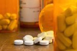Prescription painkillers, oxycodone, spilled from a bottle-rural opioid