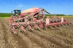 Planting corn trailed planter in the field