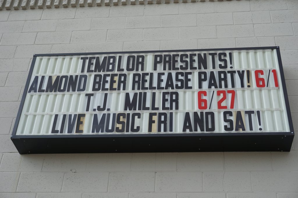 almond beer release party sign