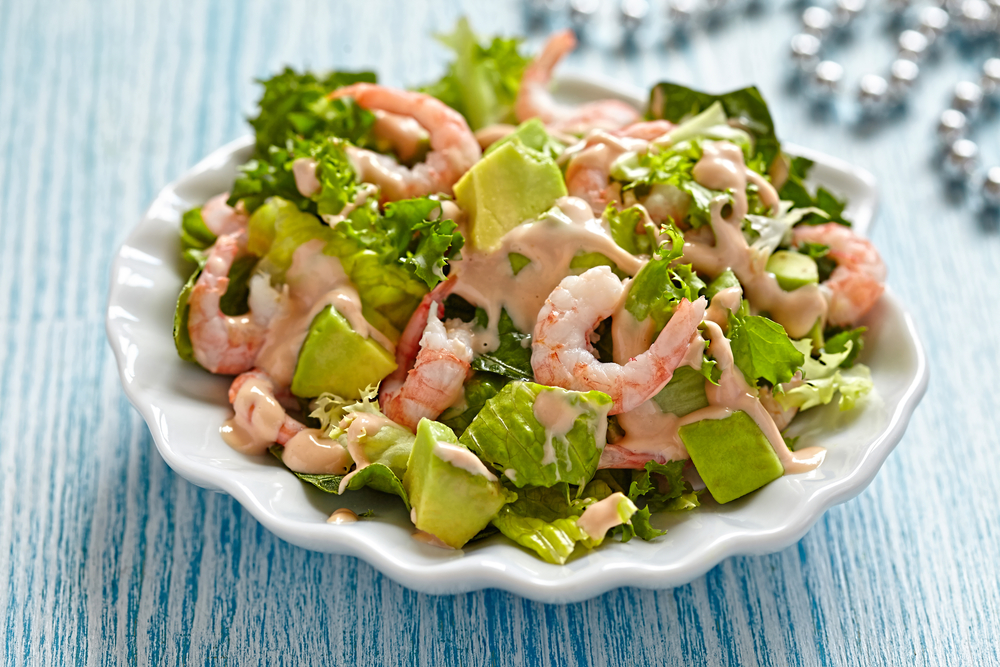 Fresh green salad with shrimp and avocado